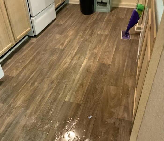 water on kitchen floor due to sewage back up